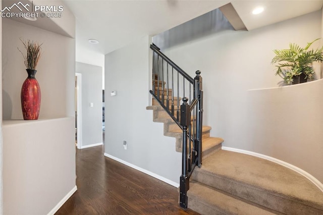 12275 Oregon Wagon Trl, Elbert, CO 80106 - stairway featuring wood finished floors and recessed lighting