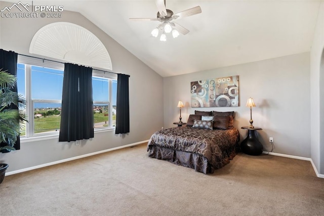12275 Oregon Wagon Trl, Elbert, CO 80106 - bedroom with carpet floors, vaulted ceiling, and a ceiling fan