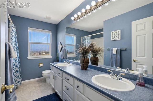 12275 Oregon Wagon Trl, Elbert, CO 80106 - full bath featuring double vanity, curtained shower, and tile patterned flooring