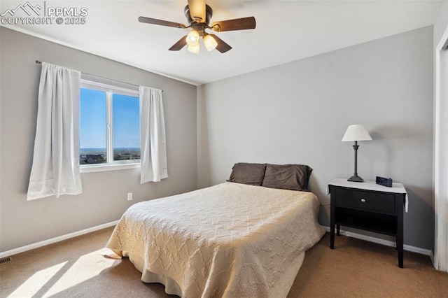 12275 Oregon Wagon Trl, Elbert, CO 80106 - carpeted bedroom featuring baseboards and ceiling fan