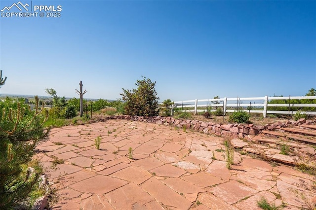 12275 Oregon Wagon Trl, Elbert, CO 80106 - view of patio / terrace featuring a water view