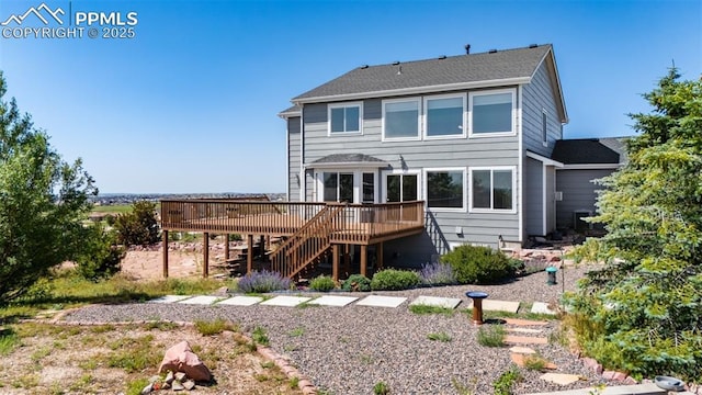 12275 Oregon Wagon Trl, Elbert, CO 80106 - rear view of property featuring stairway and a wooden deck