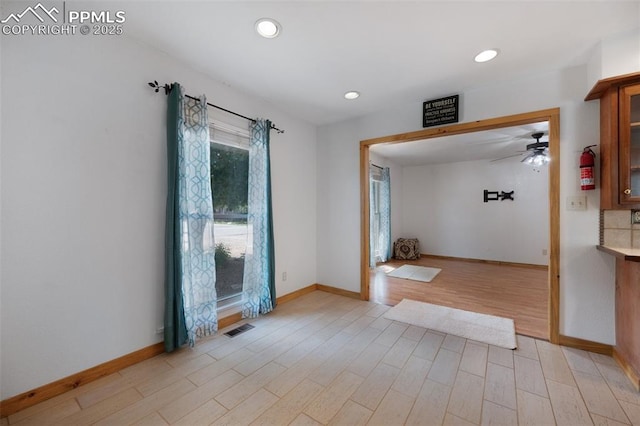 1112 W 4th St, Florence, CO 81226 - empty room featuring a ceiling fan, light wood-style floors, and recessed lighting