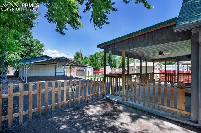 1112 W 4th St, Florence, CO 81226 - exterior space with a detached garage and a shed