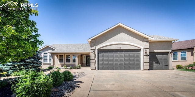 7145 Appletree Loop, Colorado Springs, CO 80925 - ranch-style home with a garage, concrete driveway, and stucco siding
