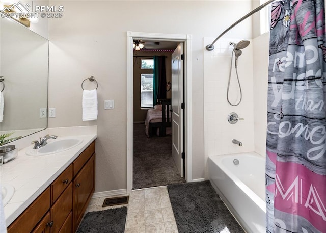7145 Appletree Loop, Colorado Springs, CO 80925 - full bath featuring double vanity, shower / tub combo with curtain, and tile patterned flooring