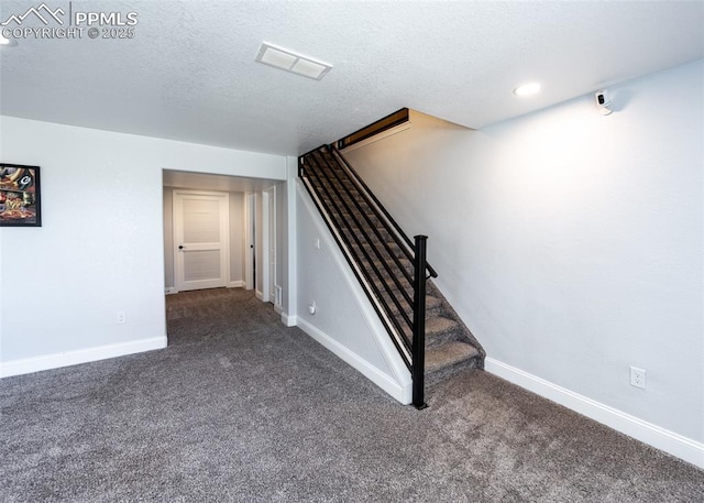 7145 Appletree Loop, Colorado Springs, CO 80925 - stairs featuring carpet flooring, a textured ceiling, and recessed lighting