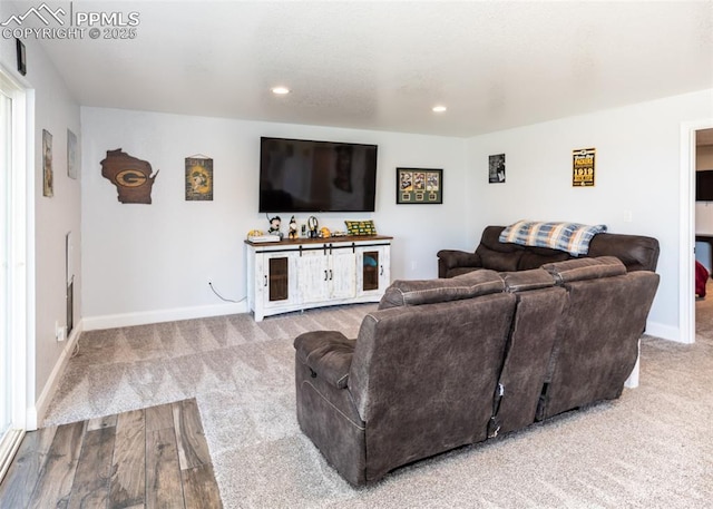 7145 Appletree Loop, Colorado Springs, CO 80925 - carpeted living area featuring baseboards and recessed lighting