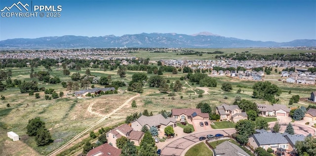 7145 Appletree Loop, Colorado Springs, CO 80925 - aerial view of residential area featuring a mountainous background