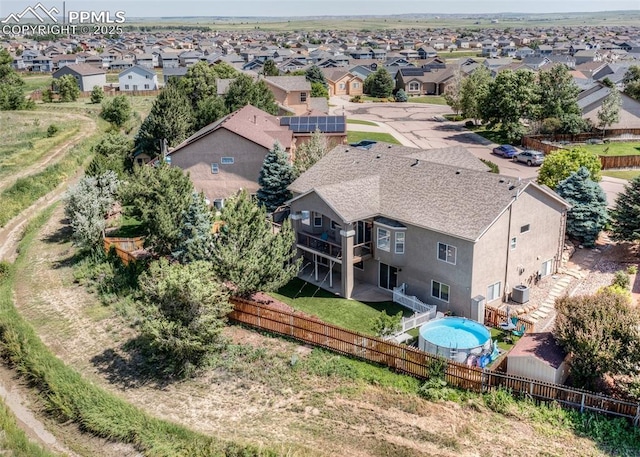 7145 Appletree Loop, Colorado Springs, CO 80925 - aerial view of residential area with a pool area