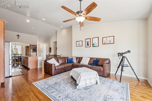 6107 Adamants Dr, Colorado Springs, CO 80924 - living room featuring a ceiling fan, lofted ceiling, wood finished floors, and recessed lighting