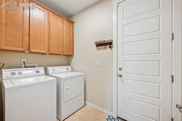 6107 Adamants Dr, Colorado Springs, CO 80924 - laundry room with cabinet space and washing machine and dryer