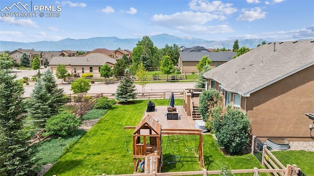 6107 Adamants Dr, Colorado Springs, CO 80924 - view of yard featuring a playground, a residential view, and a mountain view