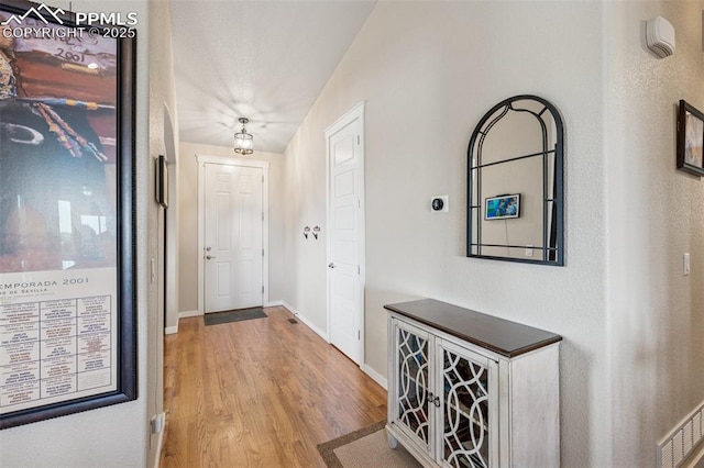 6107 Adamants Dr, Colorado Springs, CO 80924 - foyer with wood finished floors and baseboards