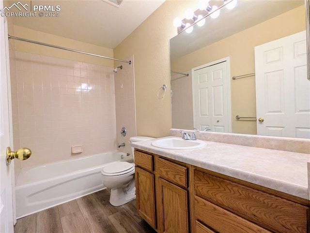 2132 Reminiscent Cir, Fountain, CO 80817 - full bathroom featuring wood finished floors,  shower combination, and vanity