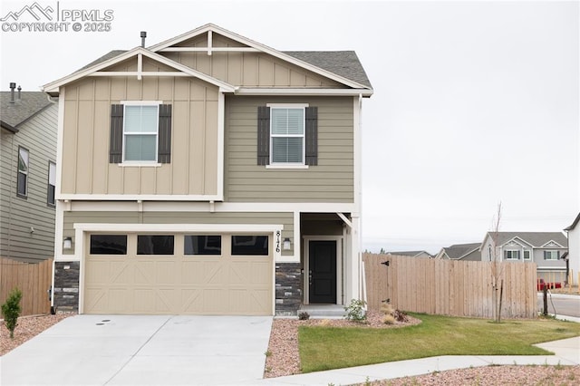 8176 Kittrick Pl, Peyton, CO 80831 - craftsman-style home with board and batten siding, driveway, stone siding, and an attached garage