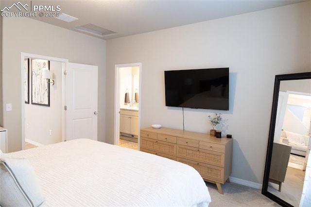 8176 Kittrick Pl, Peyton, CO 80831 - bedroom featuring light colored carpet and ensuite bathroom