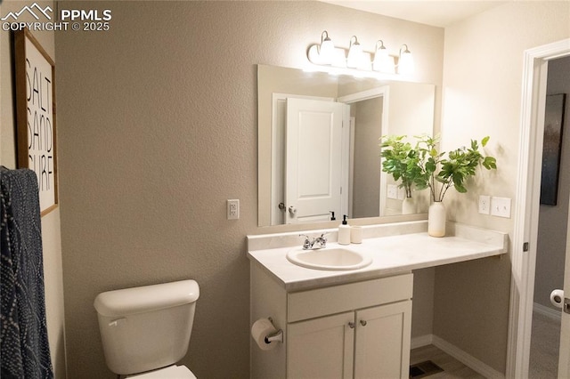 8176 Kittrick Pl, Peyton, CO 80831 - bathroom with vanity and toilet