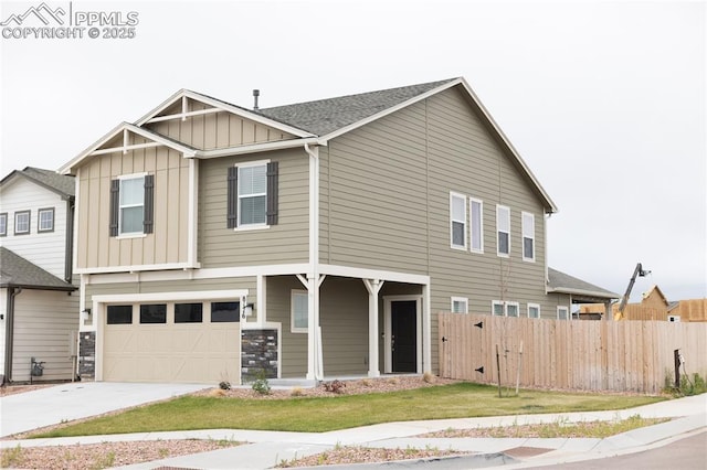 8176 Kittrick Pl, Peyton, CO 80831 - view of front facade with board and batten siding, concrete driveway, and a garage