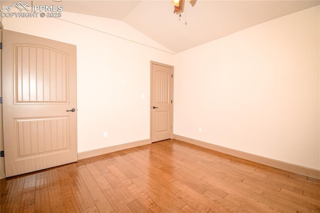 5707 Mark Twain Ln, Pueblo, CO 81008 - spare room with vaulted ceiling, hardwood / wood-style floors, and a ceiling fan