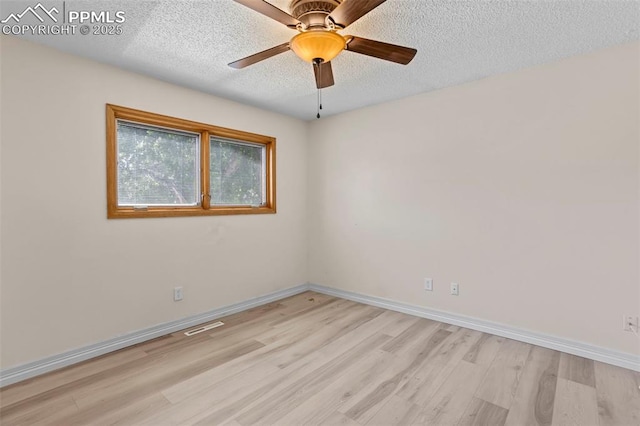 5888 Eldora Dr, Colorado Springs, CO 80918 - empty room featuring light wood-type flooring, a textured ceiling, and a ceiling fan