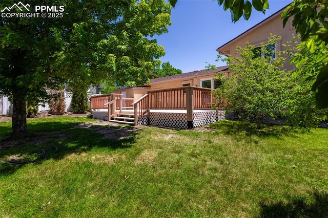 5888 Eldora Dr, Colorado Springs, CO 80918 - view of yard with a wooden deck