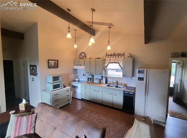 237 Blue Spruce Rd, Divide, CO 80814 - kitchen with white appliances, tasteful backsplash, beamed ceiling, light countertops, and high vaulted ceiling