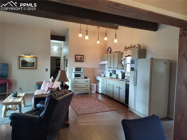 237 Blue Spruce Rd, Divide, CO 80814 - living area with beam ceiling and dark wood-style floors