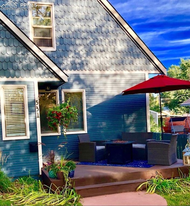 531 N Cedar St, Colorado Springs, CO 80903 - view of exterior entry featuring outdoor lounge area