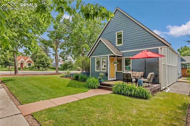 531 N Cedar St, Colorado Springs, CO 80903 - victorian-style house featuring a front yard and an outdoor hangout area