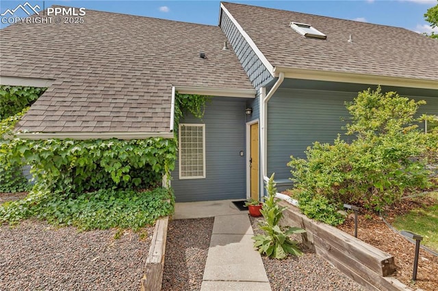 531 N Cedar St, Colorado Springs, CO 80903 - doorway to property with roof with shingles