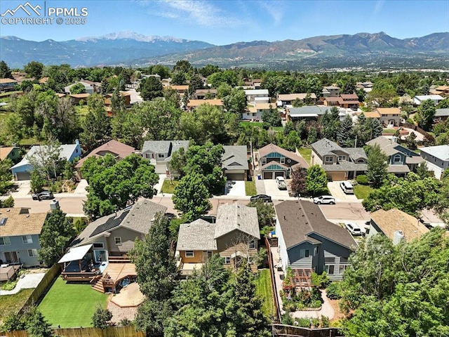 6275 Montarbor Dr, Colorado Springs, CO 80918 - aerial perspective of suburban area with mountains