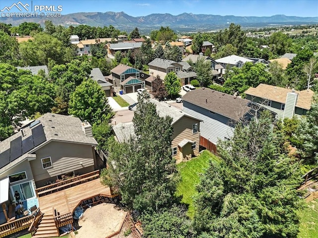 6275 Montarbor Dr, Colorado Springs, CO 80918 - aerial perspective of suburban area featuring a mountain backdrop