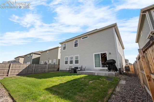 244 S Chipeta Way, Lochbuie, CO 80603 - rear view of house with a patio, a fenced backyard, and a residential view
