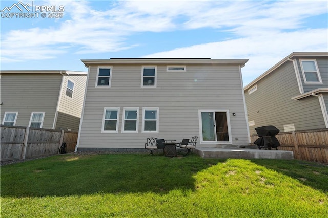 244 S Chipeta Way, Lochbuie, CO 80603 - rear view of property featuring a fenced backyard and a patio area