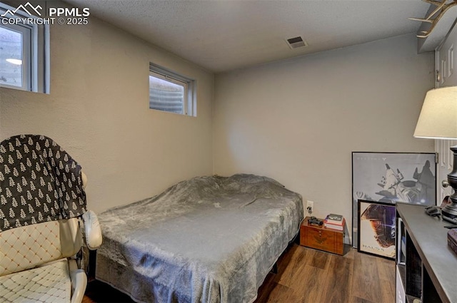 1222 Hartford St, Colorado Springs, CO 80906 - bedroom featuring wood finished floors