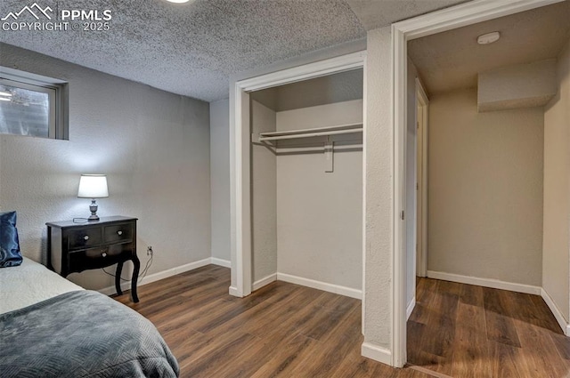 1222 Hartford St, Colorado Springs, CO 80906 - bedroom with wood finished floors, a textured ceiling, and a closet
