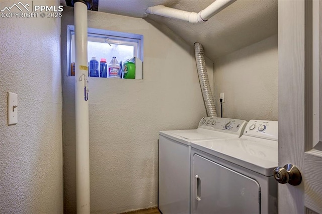 1222 Hartford St, Colorado Springs, CO 80906 - washroom featuring washing machine and dryer and a textured wall