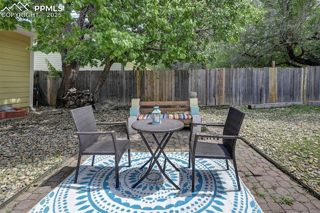 1222 Hartford St, Colorado Springs, CO 80906 - fenced backyard featuring a patio