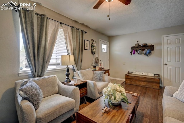 1222 Hartford St, Colorado Springs, CO 80906 - living area with ceiling fan, a textured ceiling, and wood finished floors