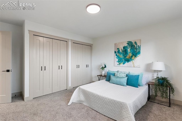 4615 Anjelina Cir, Colorado Springs, CO 80916 - carpeted bedroom with two closets and baseboards