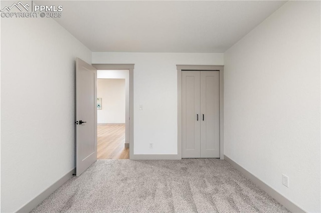 4615 Anjelina Cir, Colorado Springs, CO 80916 - unfurnished bedroom featuring carpet and a closet