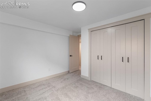 4615 Anjelina Cir, Colorado Springs, CO 80916 - unfurnished bedroom with carpet floors and a closet