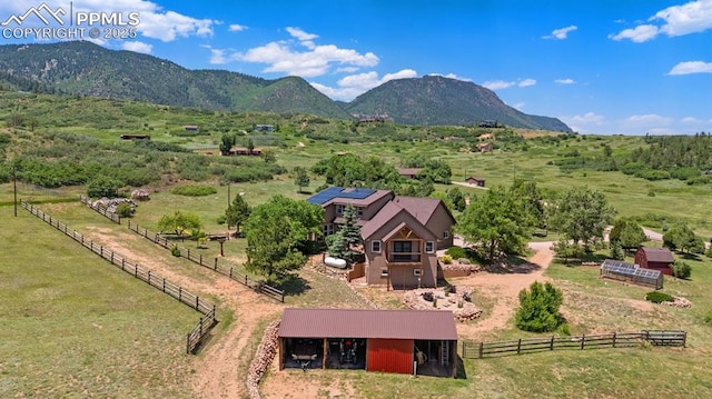 4115 Hay Creek Rd, Colorado Springs, CO 80921 - aerial view of sparsely populated area with a mountain backdrop and agricultural land