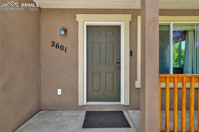2601 Lynbarton Pt, Colorado Springs, CO 80918 - entrance to property featuring stucco siding