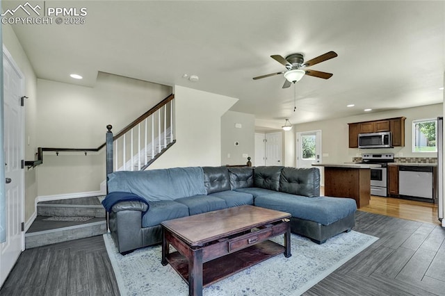 2601 Lynbarton Pt, Colorado Springs, CO 80918 - living room with stairs, ceiling fan, recessed lighting, healthy amount of natural light, and wood finished floors