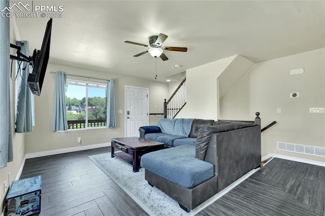 2601 Lynbarton Pt, Colorado Springs, CO 80918 - living area with a ceiling fan, stairway, and dark wood-type flooring
