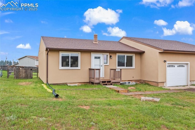 1005 Mountain View Rd, Woodland Park, CO 80863 - view of front of home featuring an attached garage, stucco siding, and roof with shingles