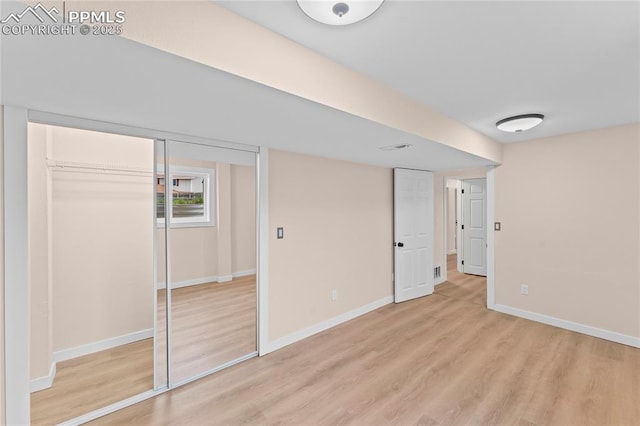 1005 Mountain View Rd, Woodland Park, CO 80863 - unfurnished bedroom with light wood-type flooring and a closet