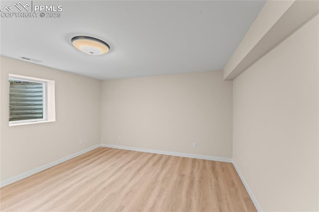 1005 Mountain View Rd, Woodland Park, CO 80863 - spare room featuring light wood finished floors and baseboards